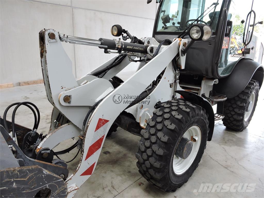 CASE 221F + Fork Wheel loaders