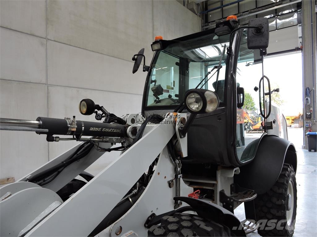CASE 221F + Fork Wheel loaders