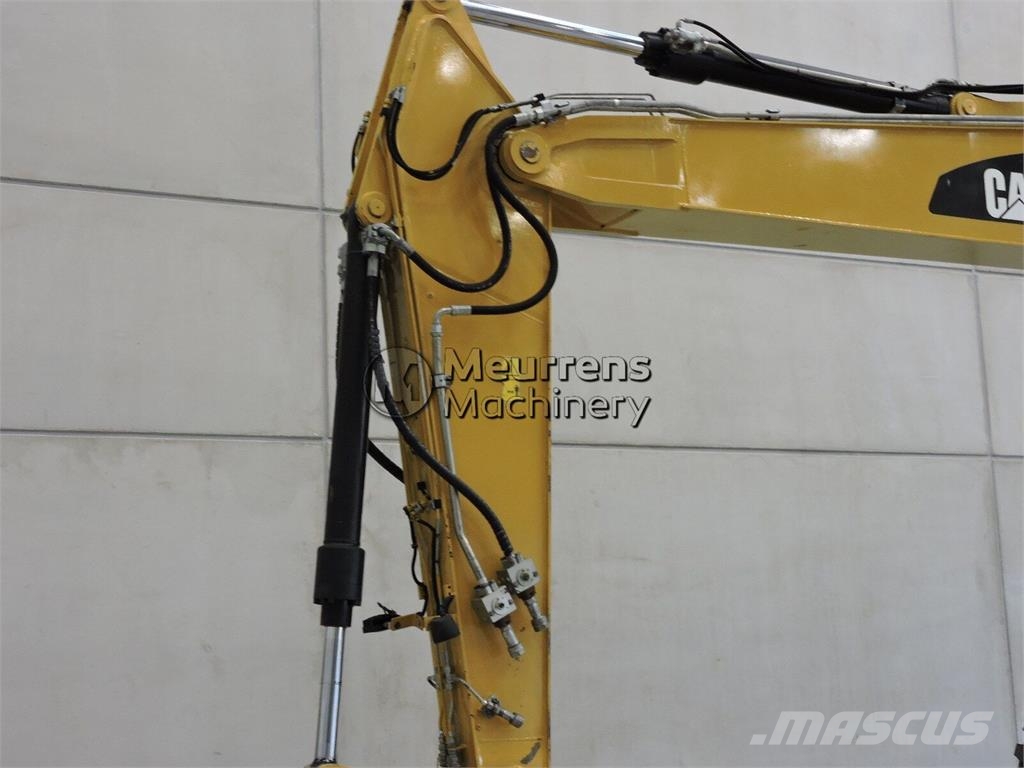 CAT M316D حفارات بعجل