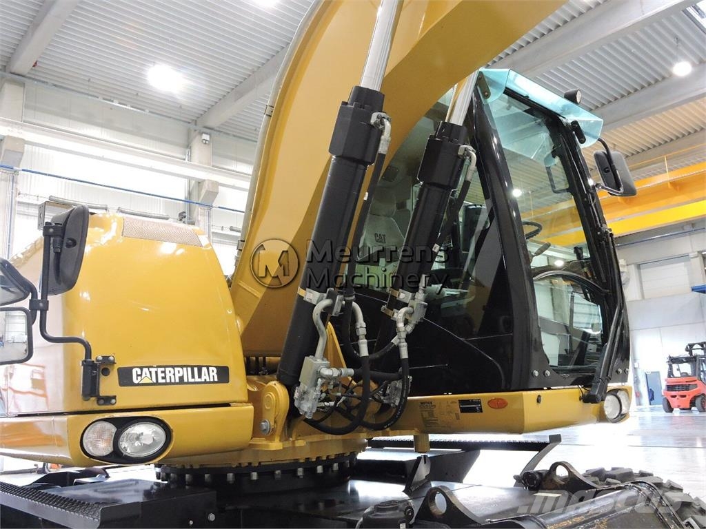 CAT M316D حفارات بعجل