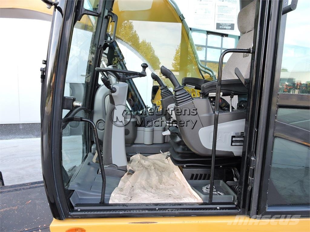 CAT M316D حفارات بعجل