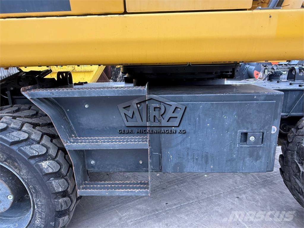 Komatsu PW 180-10 حفارات بعجل