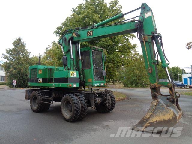 CAT 212 B FT Pelle sur pneus