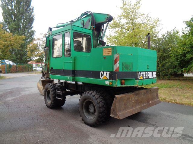 CAT 212 B FT Pelle sur pneus