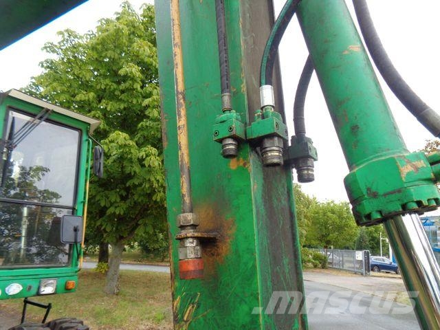 CAT 212 B FT Pelle sur pneus
