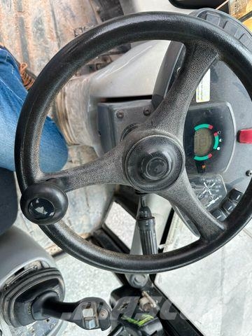 CAT 906H Ratiniai ekskavatoriai