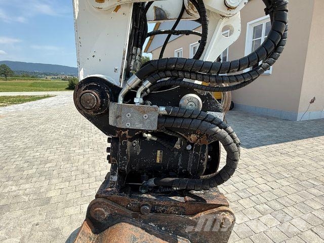 CAT M315D mit Powertilt حفارات بعجل