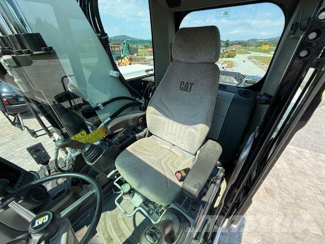 CAT M315D mit Powertilt حفارات بعجل