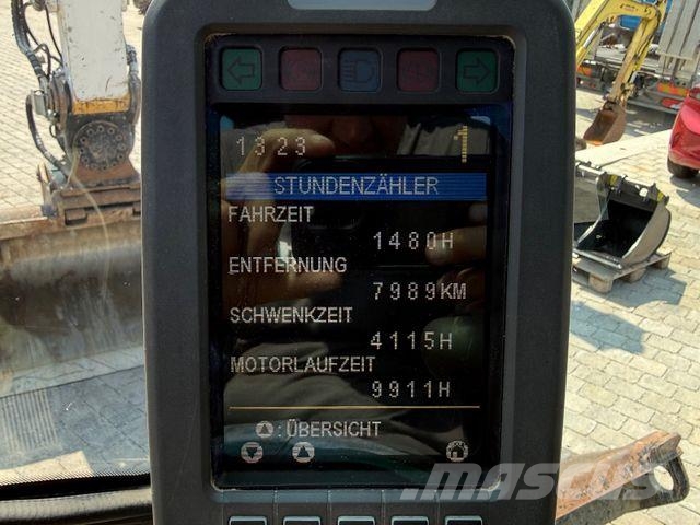 CAT M315D mit Powertilt حفارات بعجل