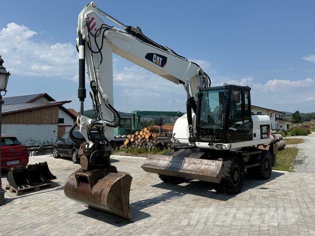 CAT M315D mit Powertilt حفارات بعجل