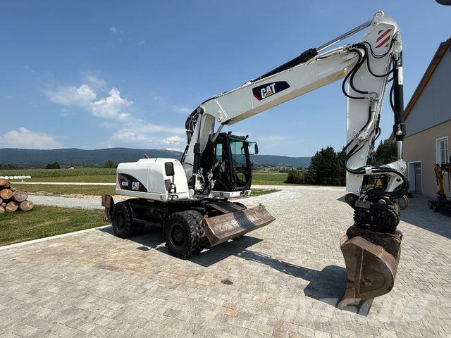CAT M315D mit Powertilt حفارات بعجل