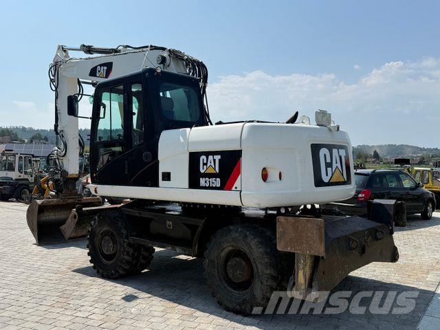 CAT M315D mit Powertilt حفارات بعجل