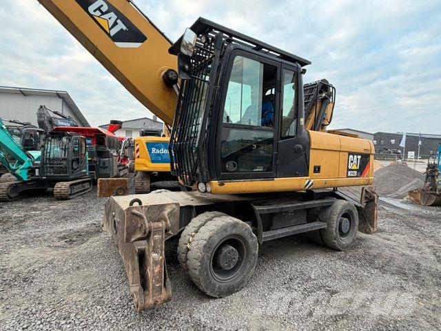 CAT M322D Hjulgravere