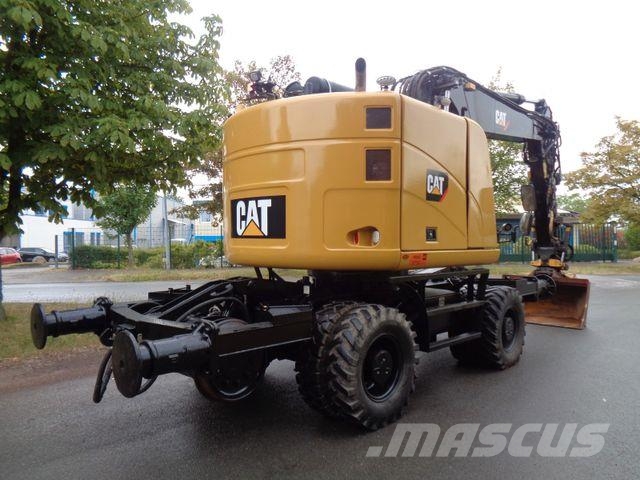 CAT M323 ZW RAIL mit Encon Tiltrotator Wielgraafmachines
