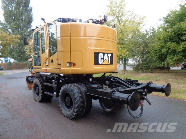 CAT M323 ZW RAIL mit Encon Tiltrotator Wielgraafmachines
