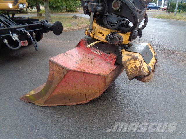 CAT M323 ZW RAIL mit Encon Tiltrotator Wielgraafmachines