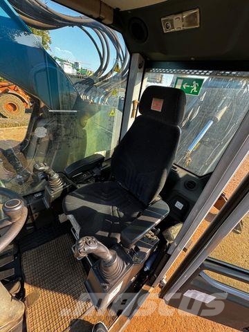 Fuchs MHL 360 F Umschlagbagger mit Greifer Wielgraafmachines