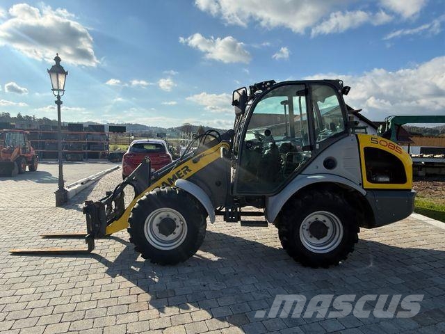Kramer 5085 mit Schaufel und Gabel Iekrāvēji uz riteņiem