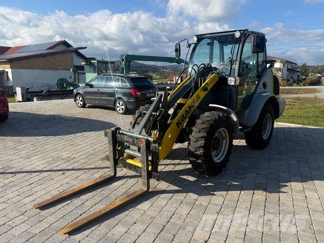 Kramer 5085 mit Schaufel und Gabel Iekrāvēji uz riteņiem