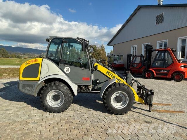 Kramer 5085 mit Schaufel und Gabel Iekrāvēji uz riteņiem