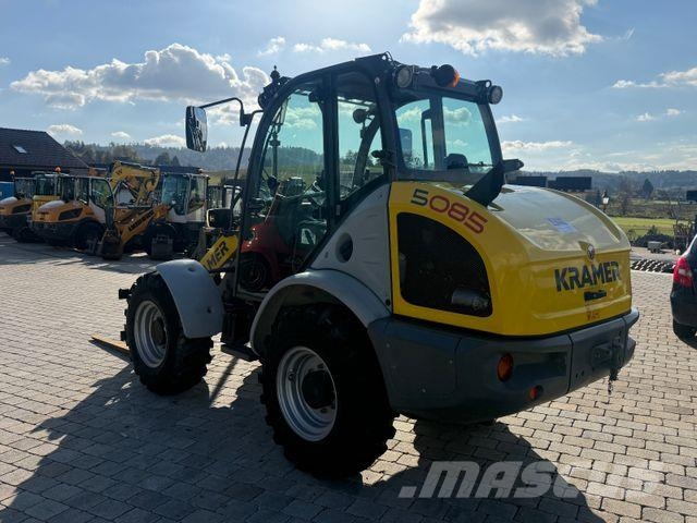 Kramer 5085 mit Schaufel und Gabel Iekrāvēji uz riteņiem