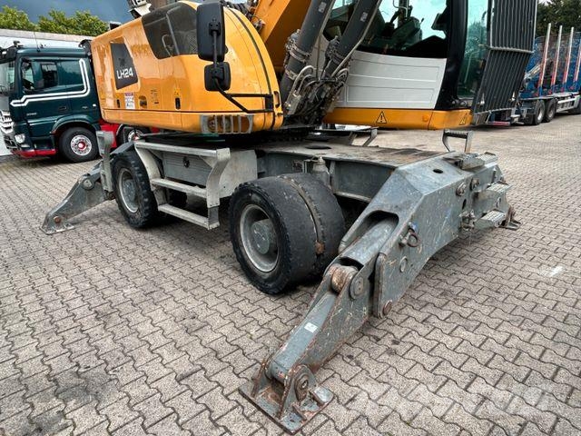Liebherr LH 24 Litronic mit Abbruch- / Sortiergreifer حفارات بعجل