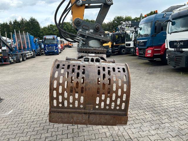 Liebherr LH 24 Litronic mit Abbruch- / Sortiergreifer حفارات بعجل