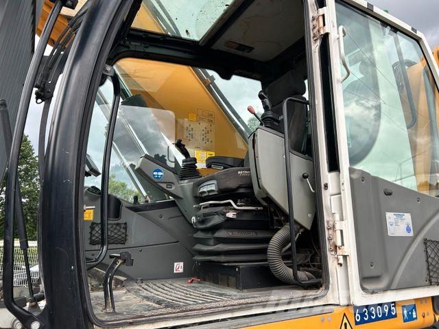 Liebherr LH 24 Litronic mit Abbruch- / Sortiergreifer حفارات بعجل