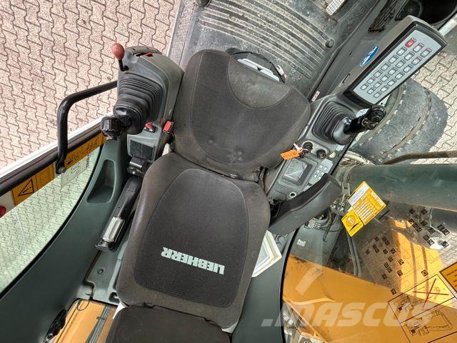 Liebherr LH 24 Litronic mit Abbruch- / Sortiergreifer حفارات بعجل