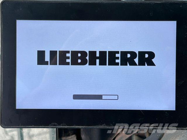 Liebherr LH 24 Litronic mit Abbruch- / Sortiergreifer حفارات بعجل