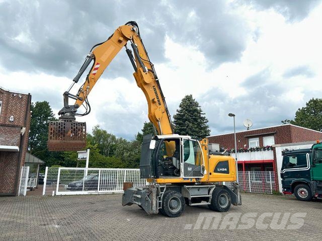 Liebherr LH 24 Litronic mit Abbruch- / Sortiergreifer حفارات بعجل