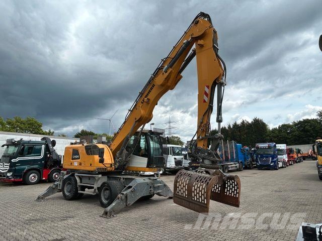 Liebherr LH 24 Litronic mit Abbruch- / Sortiergreifer حفارات بعجل