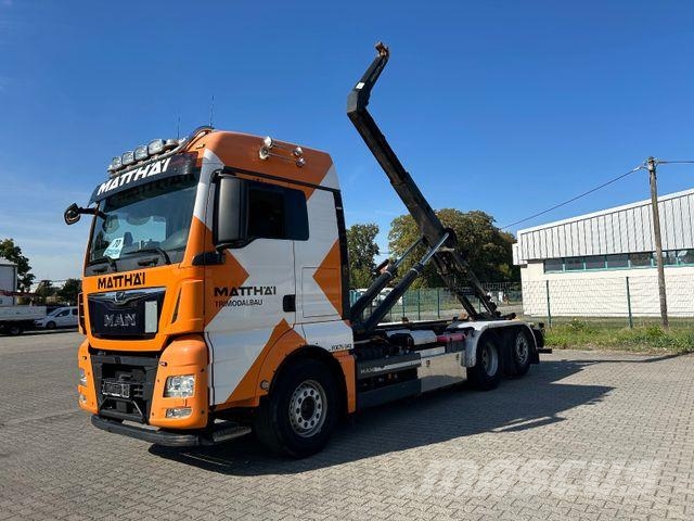 MAN TGX 26.510 BL / 6x2-4 / Meiller RS 21 + Funk Abrollkipper