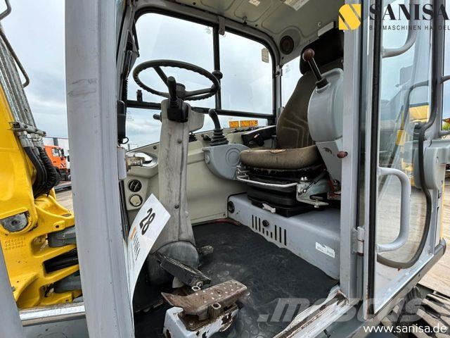 Wacker Neuson9503 EW/SW/4X4X4/Hydr. Verstell. /4800 Std حفارات بعجل