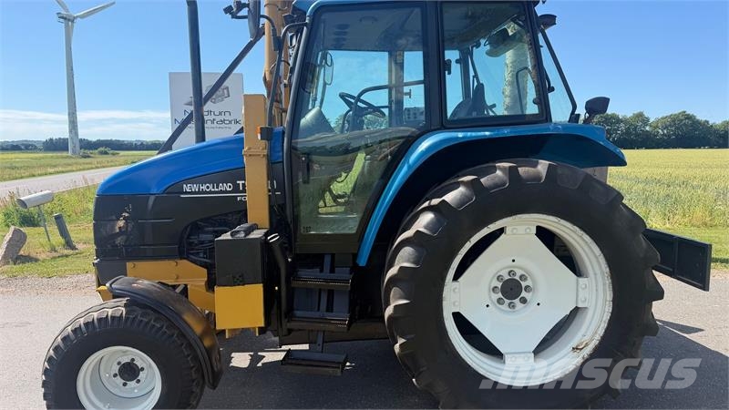 New Holland TS100 Fin TS100 med rabatklipper Tracteur