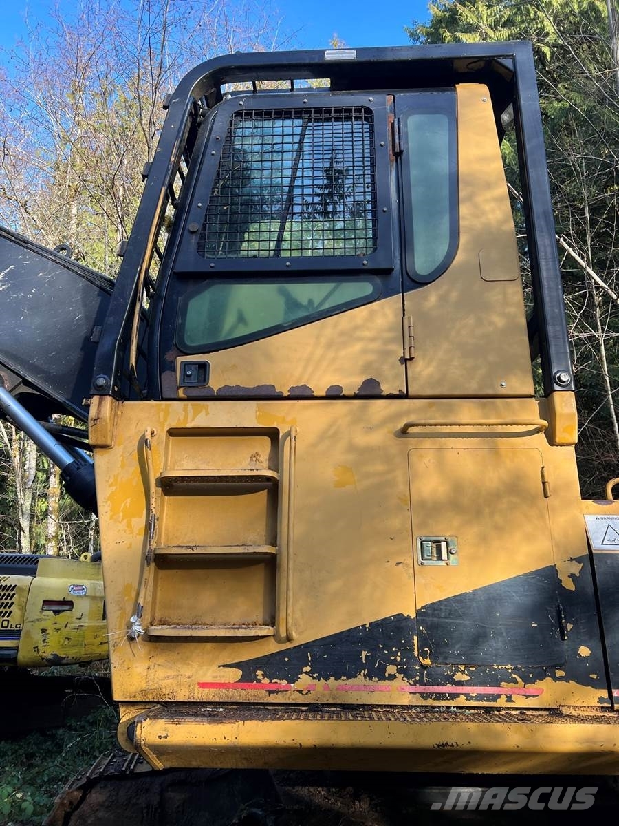 CAT 325BL Cargadora forestal