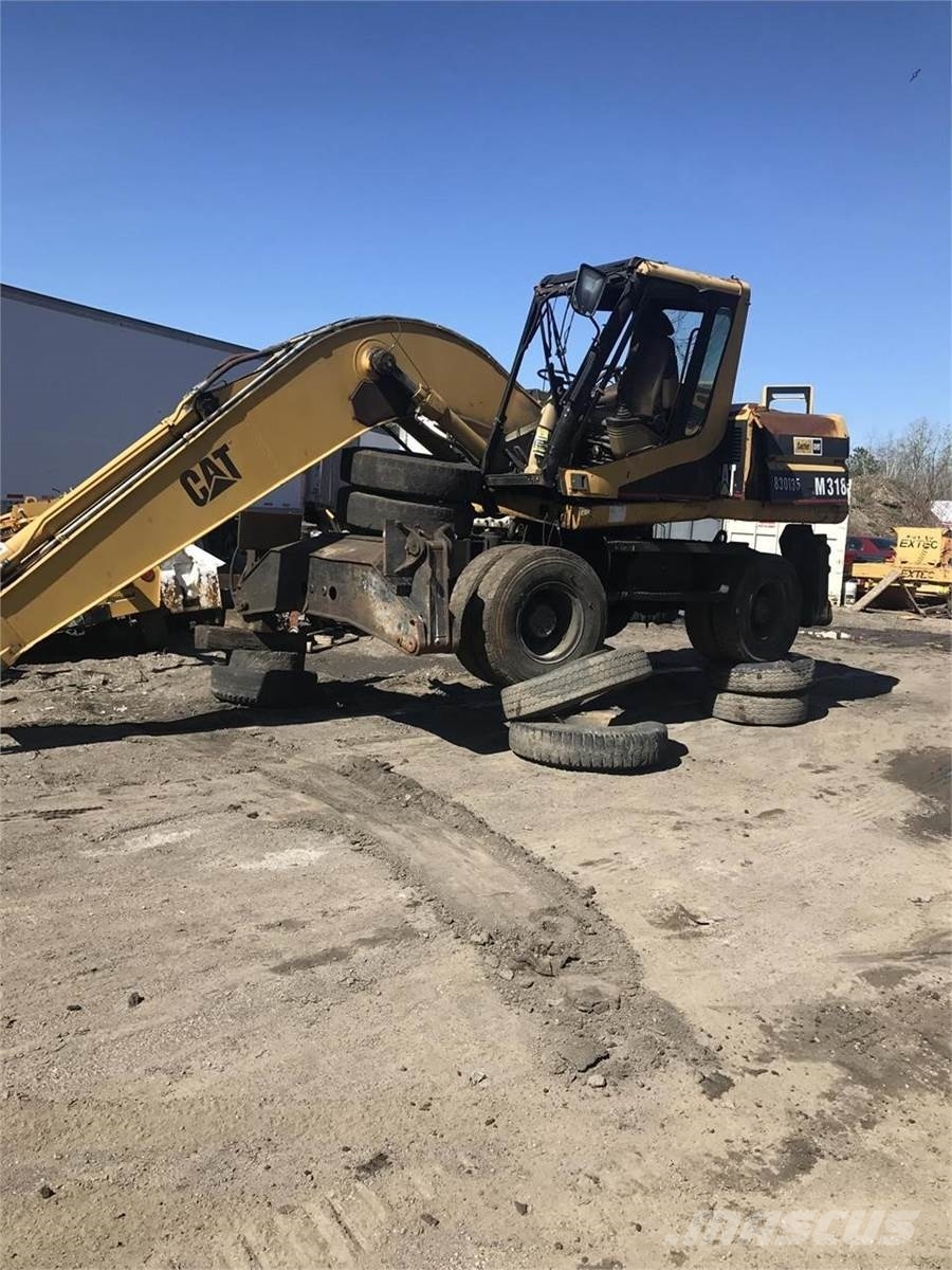 Cat M318, Pittston, Pennsylvania, アメリカ - 中古 ホイール式