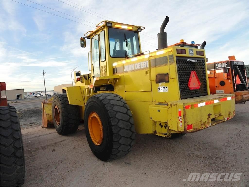 John Deere 644G Фронтальные погрузчики