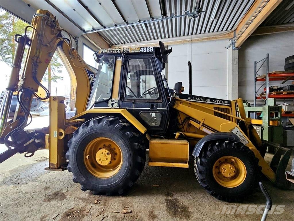 CAT 438B, trukkipiikit, 6 kauhaa Rovokopači