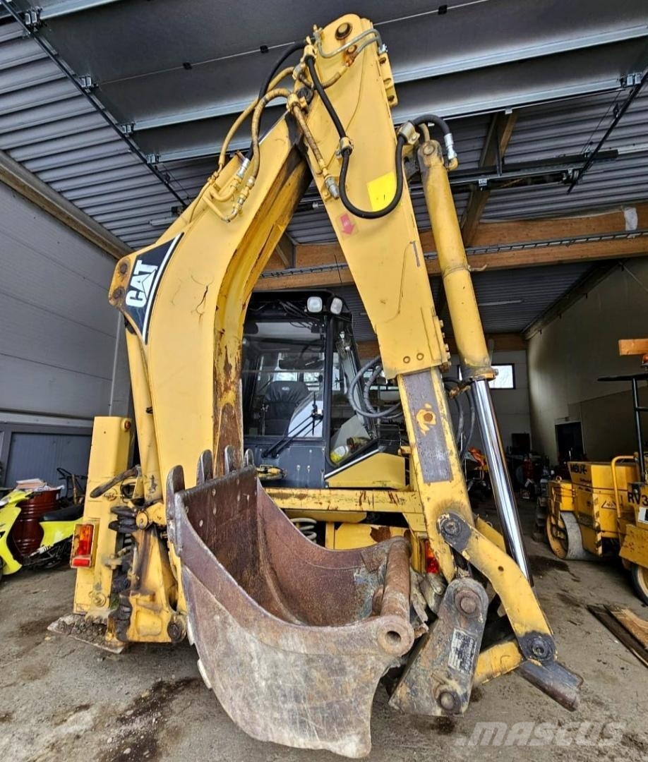 CAT 438B, trukkipiikit, 6 kauhaa Rovokopači