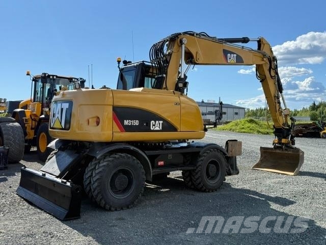 CAT M315D Ratiniai ekskavatoriai