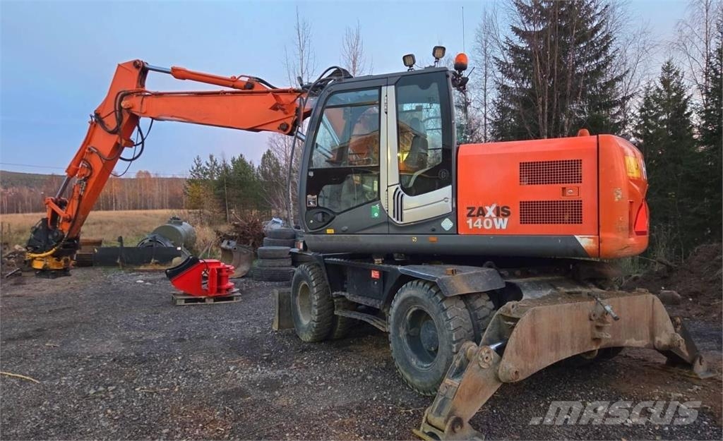 Hitachi ZX140W-3, Engcon, Webasto, 3 kauhaa, rasvari Ekskavatori uz riteņiem