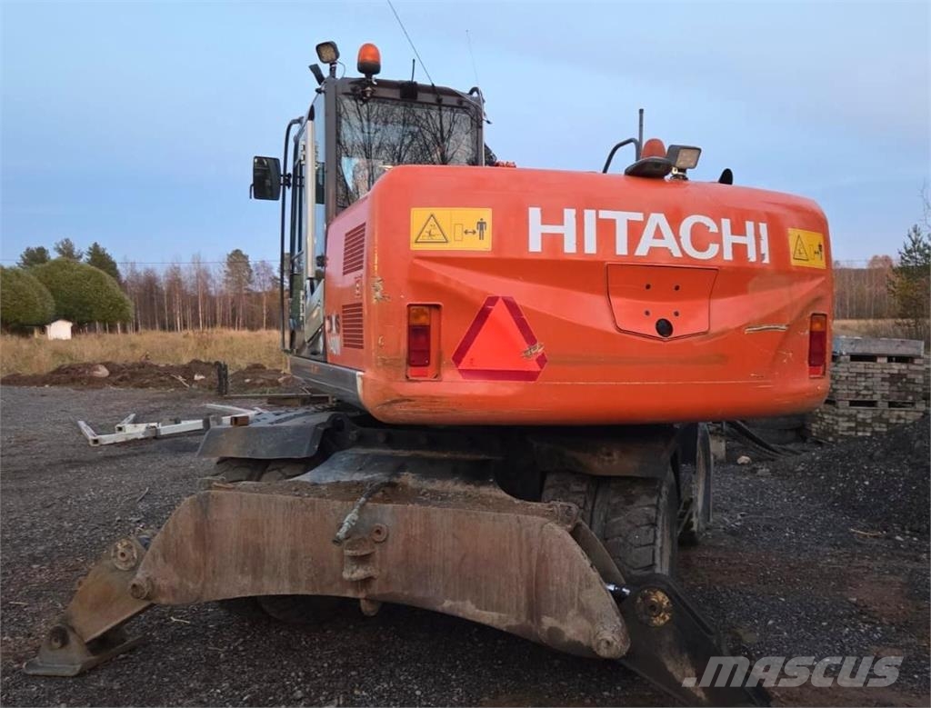 Hitachi ZX140W-3, Engcon, Webasto, 3 kauhaa, rasvari Ekskavatori uz riteņiem