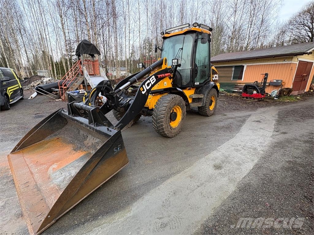 JCB 409 *VAIN 2864h* Nivelaura, kaksi kauhaa saatavill Hjullastare