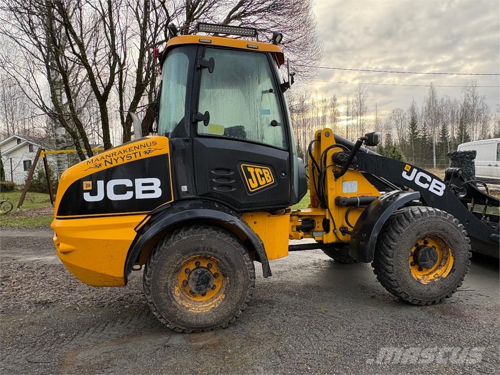 JCB 409 *VAIN 2864h* Nivelaura, kaksi kauhaa saatavill Hjullastare