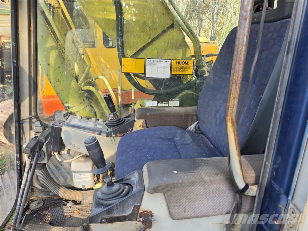 Komatsu PC240LC-3, Kallistuva luiskakauha Telakaivukoneet