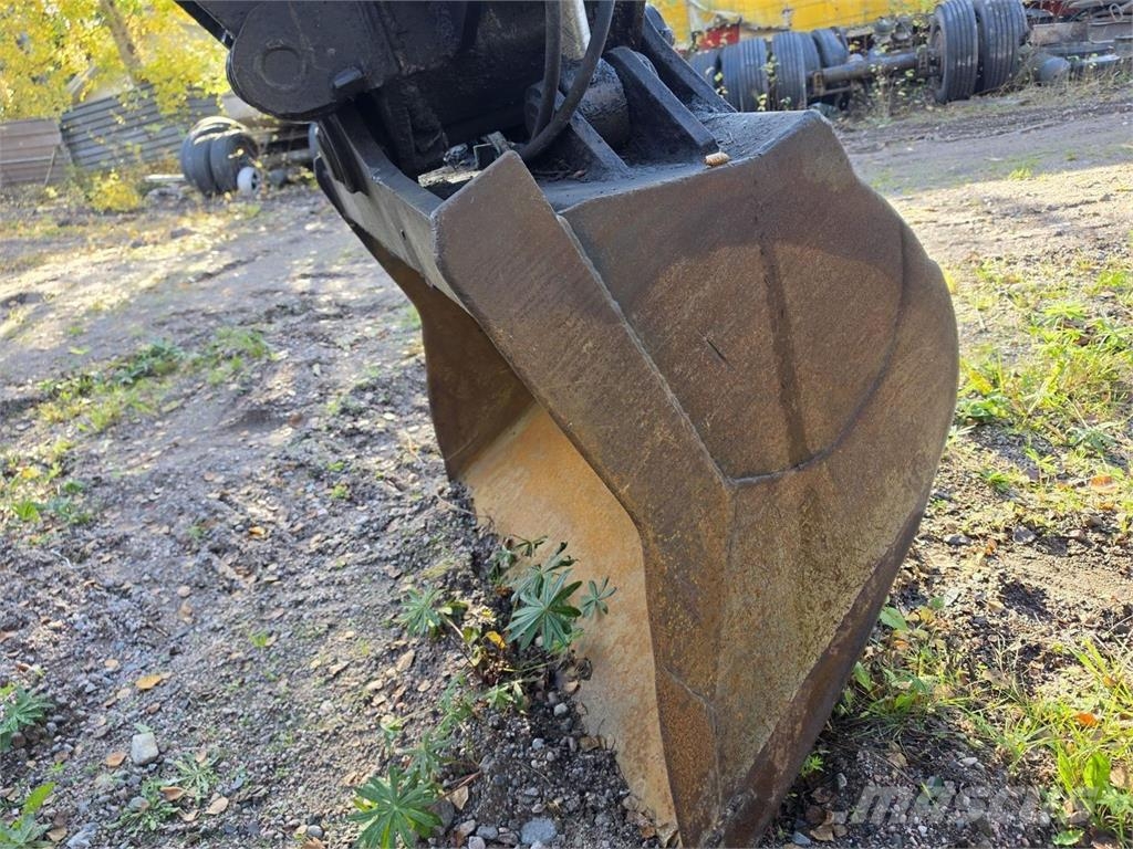 Komatsu PC240LC-3, Kallistuva luiskakauha Telakaivukoneet