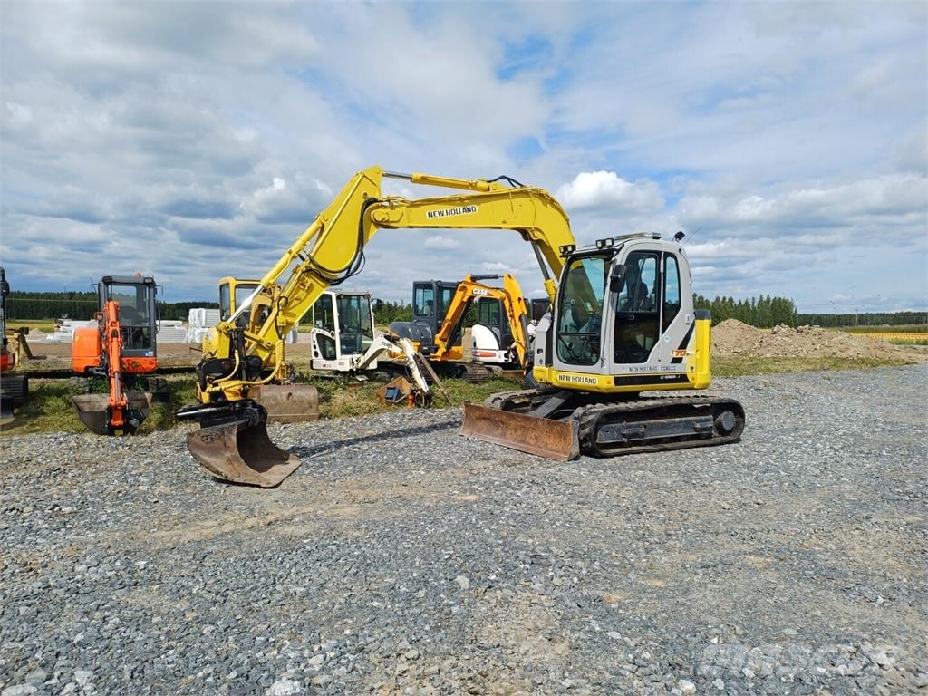 New Holland E70BSR-2 pihti engconilla Midigraafmachines 7t - 12t