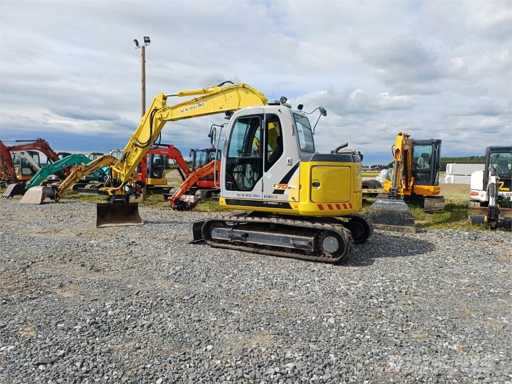 New Holland E70BSR-2 pihti engconilla Midigraafmachines 7t - 12t