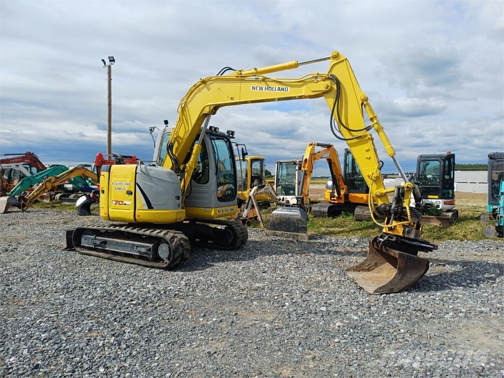 New Holland E70BSR-2 pihti engconilla Midigraafmachines 7t - 12t